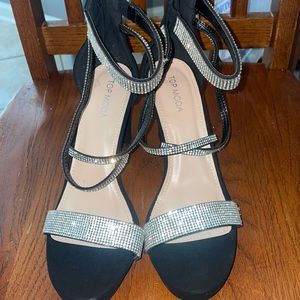 Black heels with rhinestones on the strap